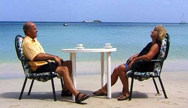 Carol and Malcolm Dent on the beach in Carriacou